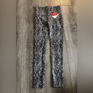 Spanx woman’s snake print leggings